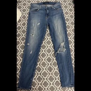 Distressed denim jeans